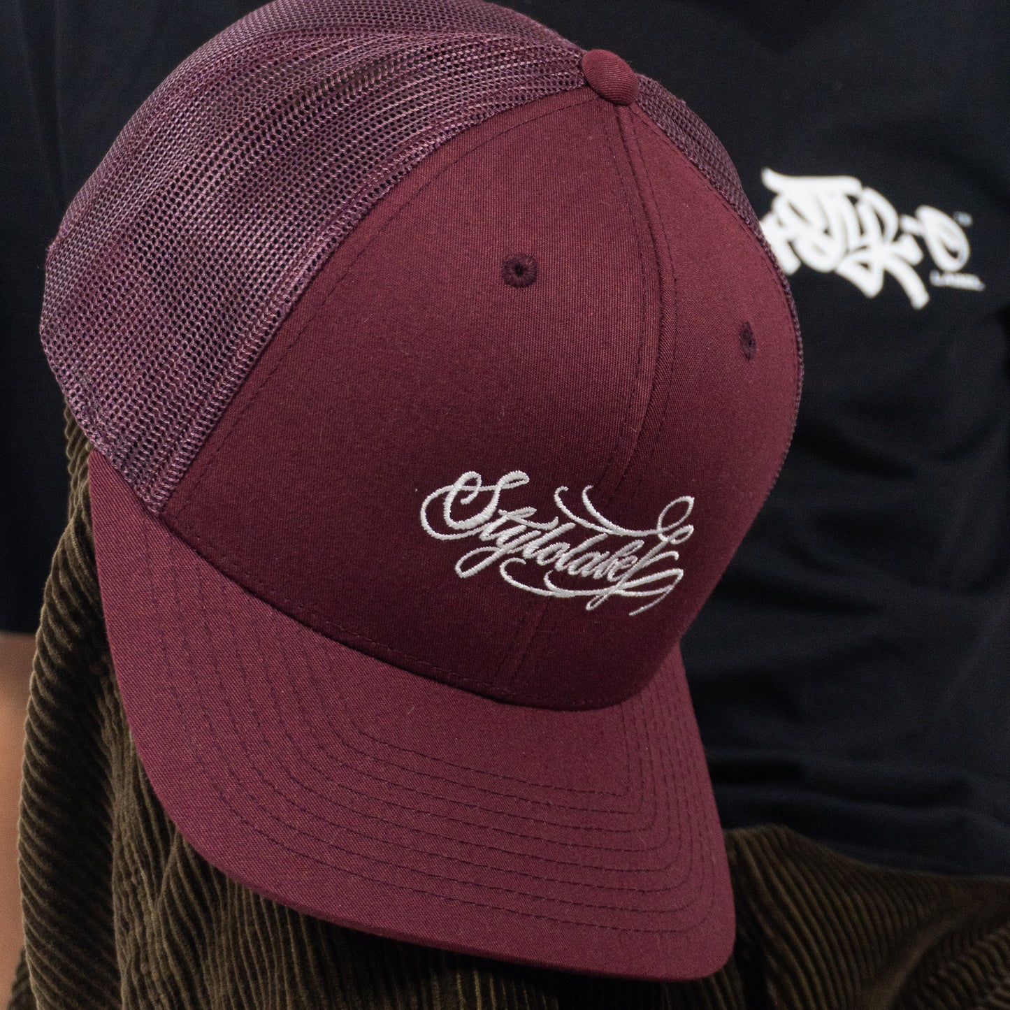 Cursive Logo Trucker Hat